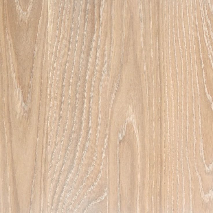 Wood grain film-covered board